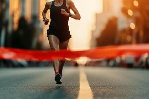 Athletic woman running towards finish line during sunset on urban street. photo