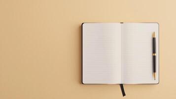 Open notebook with blank pages and a pen, flat lay on a beige background. photo