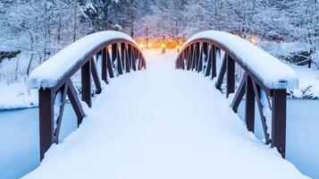 Snow-covered bridge in a serene winter landscape with soft lighting. photo