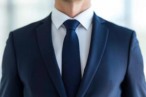 Businessman in formal suit and tie, modern office environment photo