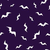 Flying bats seamless pattern on a dark background for Halloween decoration. Design for wallpapers, backdrop and wrapping vector