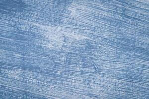 building wall with blue paint - urban background and texture photo