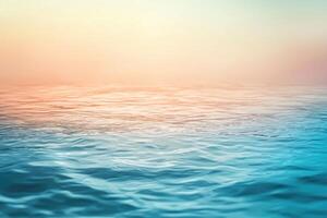 Abstract Close Up of Rippling Water with Soft Pink and Yellow Gradient in the Background photo