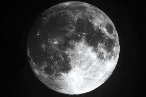 A Close-up View of the Moon's Surface, Revealing Craters and Texture photo