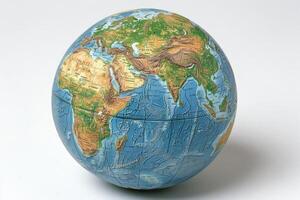 A globe with a map of the world on it photo