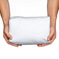 Hands holding a white pillow against a transparent background, showcasing relaxation and comfort concepts png