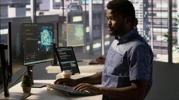 Data scientist working with machine learning artificial intelligence technology critical to autonomous systems. IT professional working with AI tech to transform data into predictive models, camera A video