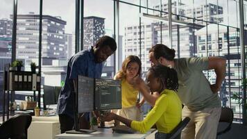 IT staff members arguing, having different ideas while testing and deploying programs and systems. Team of programmers fighting in office while checking code, having disagreement, camera B video