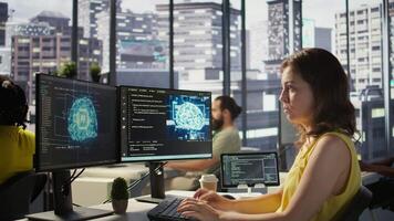 System administrator at work doing debugging of AI software using PC, checking glitches in lines of code. IT specialist in office fixing artificial intelligence coding issues using computer, camera B video