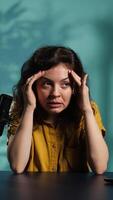 Vertical Influencer feeling angry, sharing concerning story during social media , talking to fans. Frustrated content creator talks with viewers, having mental breakdown in front of subscribers, camera B video