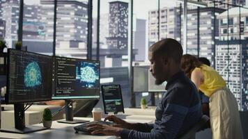 Programmer creating AI machine learning models that can analyze data to automate decision making processes, handheld camera shot. IT professional doing artificial intelligence programming, camera B video
