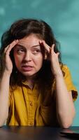 Vertical Influencer feeling angry, sharing concerning story during social media , talking to fans. Frustrated content creator talks with viewers, having mental breakdown in front of subscribers, camera A video