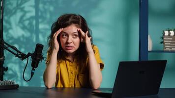 Influencer feeling angry, sharing concerning story during social media , talking to fans. Frustrated content creator talks with viewers, having mental breakdown in front of subscribers, camera A video