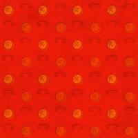Red grungy pattern with Christmas baubles vector