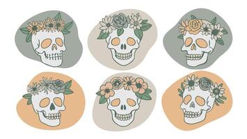 Set of skull illustrations, boho style with floral elements, Day of the Dead designs or fall decor vector