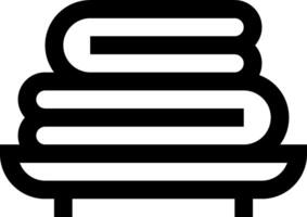 A stack of books on a table vector