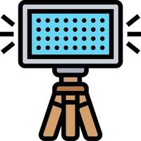 A camera on a tripod with a light vector