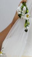 put a wreath on a mannequin on a veil with beautiful embroidery video