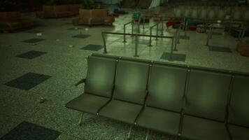 Abandoned airport terminal filled with empty seats and scattered debris video