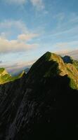 Aerial view of mountain peaks in the sun photo