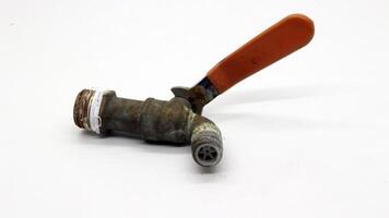 Broken and rusty water tap photo