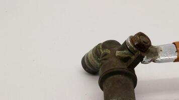 Broken and rusty water tap photo