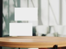 Clean minimal business card mockup on table with office background photo
