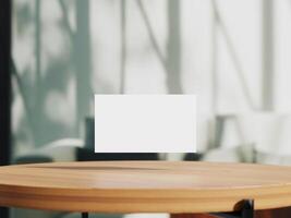 Clean minimal business card mockup on table with office background photo