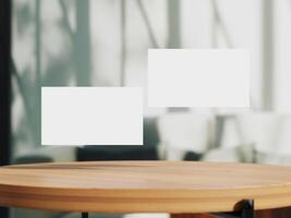 Clean minimal business card mockup on table with office background photo
