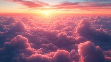 The sun is setting over the clouds photo