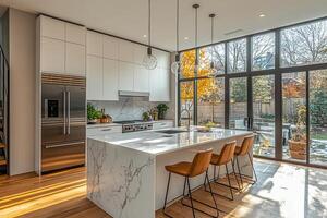 Minimalist kitchen featuring clean white cabinetry, sleek countertops, and modern appliances. photo