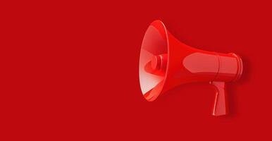 A bright red megaphone is positioned against a vibrant red background. The megaphone is angled slightly towards the viewer, creating a dynamic and eye-catching composition. photo