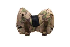 A tactical barricade bag in a camouflage pattern. The bag is designed to provide stability for firearms when shooting from barricades or uneven surfaces.Isolate on white back. photo