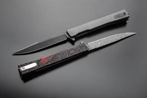 Two pocket folding knives with decorative handles on a dark surface, one open and one closed, showcasing intricate patterns and craftsmanship photo