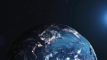 Detailed view of Earth from space showcasing bright city lights at night and the dazzling brightness of the sun illuminating the planet photo