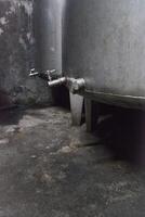 Large scale wine storage thermostat tanks in rural Portugal. Concept of winemaking and production of Portuguese wine. photo