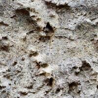 Seamless texture a concrete surface with scratches and color perfect for rendering surfaces. photo