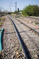 View of train Railway Tracks from the middle during daytime at Amritsar railway station in India, Train railway track view, Indian Railway junction, Heavy industry photo