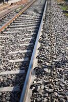 View of train Railway Tracks from the middle during daytime at Amritsar railway station in India, Train railway track view, Indian Railway junction, Heavy industry photo