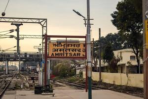 Amritsar, India, June 03 2024 - Amritsar railway station platform during morning time, Amritsar Railway station banner at Amritsar, Punjab railway station photo