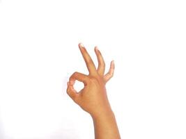 OK and okay, hand gesture of male, sign isolated on white background photo