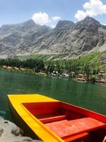 A view of Dal Lake in winter, and the beautiful mountain range in the background in the city of skardu , India. Suitable for banners, posts, social media, news, background. photo