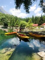 A view of Dal Lake in winter, and the beautiful mountain range in the background in the city of skardu , India. Suitable for banners, posts, social media, news, background. photo