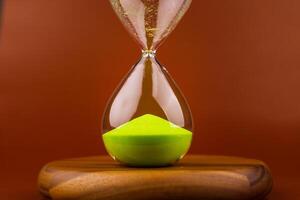 Hourglass with running out of time Concept of time and life Work with time as a deadline photo