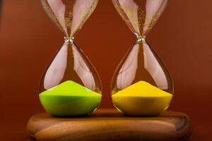 Hourglass with running out of time Concept of time and life Work with time as a deadline photo