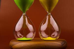 Hourglass with running out of time Concept of time and life Work with time as a deadline photo