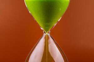 Hourglass with running out of time Concept of time and life Work with time as a deadline photo