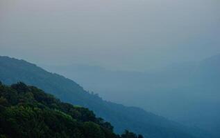 Mountains and lush forests, natural attractions, tranquility and relaxation in the fresh air. photo