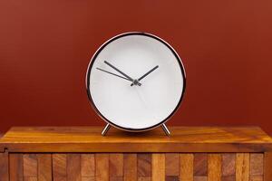 Alarm clock telling time and working with limited time. Photo of clock in studio. Time and life.