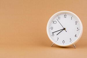 Alarm clock telling time and working with limited time. Photo of clock in studio. Time and life.